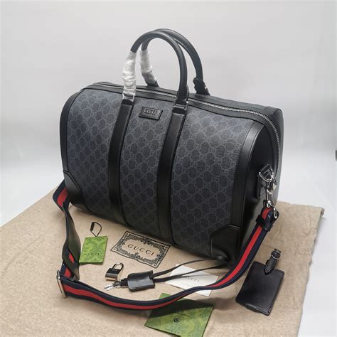 gucci leather duffle bag with patches|gucci carry on duffle bag.